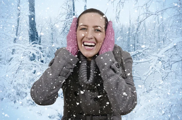 Woman and snowfall — Stock Photo, Image
