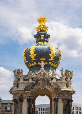 Dresden, Germany - June 28, 2022: The crown gate with the long galleries adjoining on both sides in the Dresdner Zwinger. Located near the inner old town. The roof with the golden ornaments