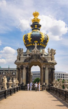 Dresden, Germany - June 28, 2022: The crown gate with the long galleries adjoining on both sides in the Dresdner Zwinger. Located near the inner old town. The roof with the golden ornaments
