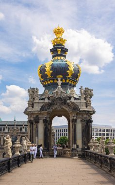 Dresden, Germany - June 28, 2022: The crown gate with the long galleries adjoining on both sides in the Dresdner Zwinger. Located near the inner old town. The roof with the golden ornaments