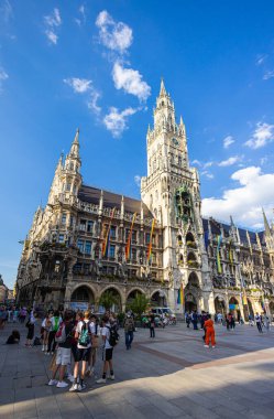 Munich, Germany - July 6, 2022: St. Luke's Church (German: St. Lukas or Lukaskirche). Located on the banks of the Isar, at the Mariannenplatz.  Huge round stained glass window, through the trees