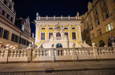 Leipzig, Germany - July 02, 2022: The city Center of the saxony metropolis at night. The old stock exchange (Alte Handelsboerse), oldest assembly building of merchants and oldest Baroque building