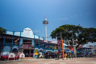 Malacca, Malaysia - August 10, 2022: View from Samudera Square to the Menara Taming Sari  observation tower. The observation platform moving up for tourist to get an aerial view of Melaka