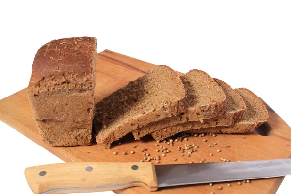 Knife, chopped rye bread — Stock Photo, Image