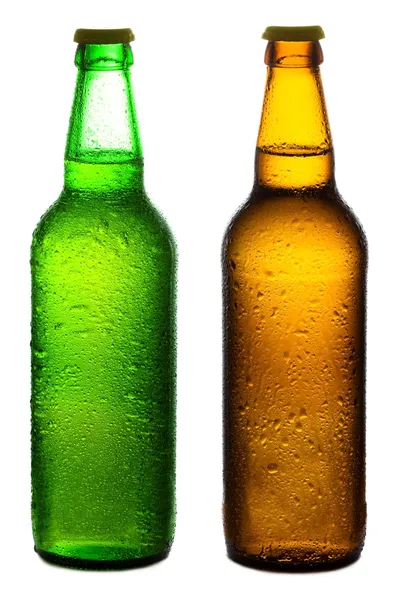 Bottiglie di birra marrone e verde Immagini Stock Royalty Free