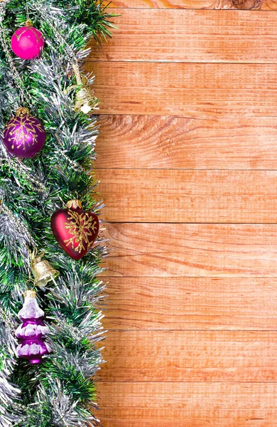 Weihnachtsbordüre mit Dekoration, Ornament auf Holzgrund — Stockfoto