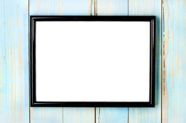 ahşap mavi zemin üzerine resim çerçevesi