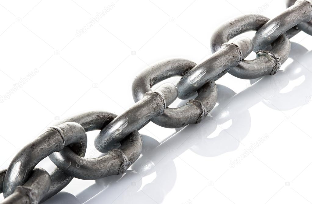 Links of steel chain closeup on white background — Stock Photo