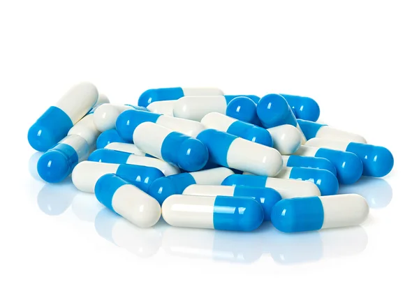 Kapsel mit blauen Pillen isoliert — Stockfoto