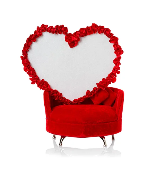 Heart and gift on the couch. Valentines Day — Stock Photo, Image