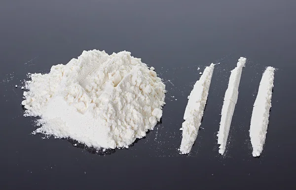 Cocaine on a black background — Stock Photo, Image