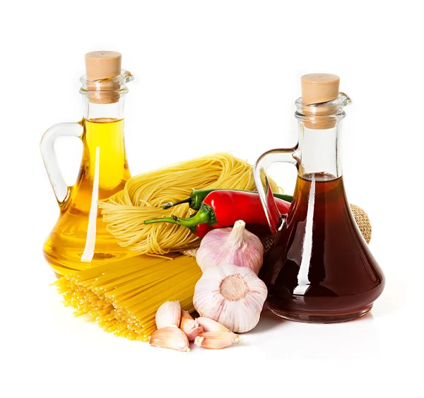 Ingredients for pasta. Spaghetti, chili, garlic isolated on white — Stock Photo, Image