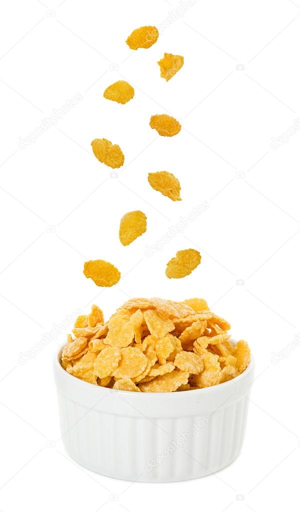 Bowl with corn flakes on the white background