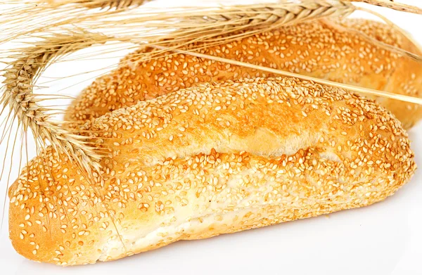 Bun, ekmek ile spikelets — Stok fotoğraf