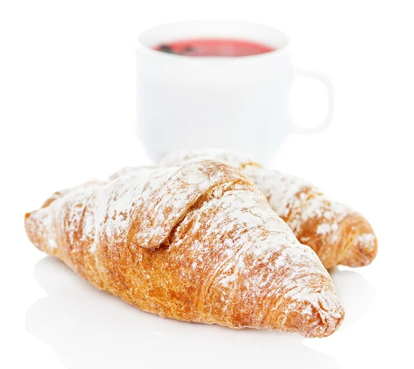 Croissants and cup of tea — Stock Photo, Image