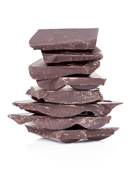 Dettaglio primo piano di parti di cioccolato su sfondo bianco . — Foto Stock
