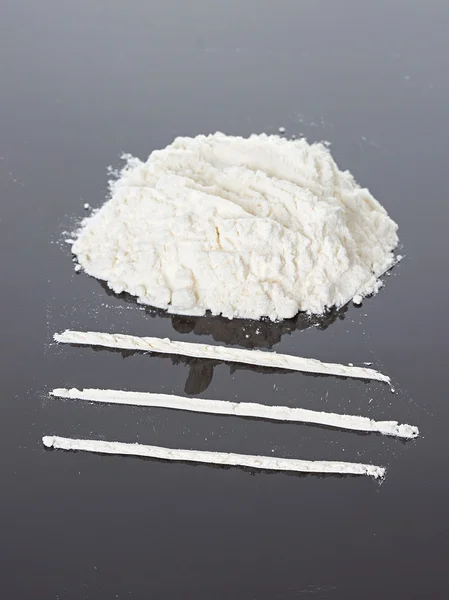 Cocaine on a black background — Stock Photo, Image