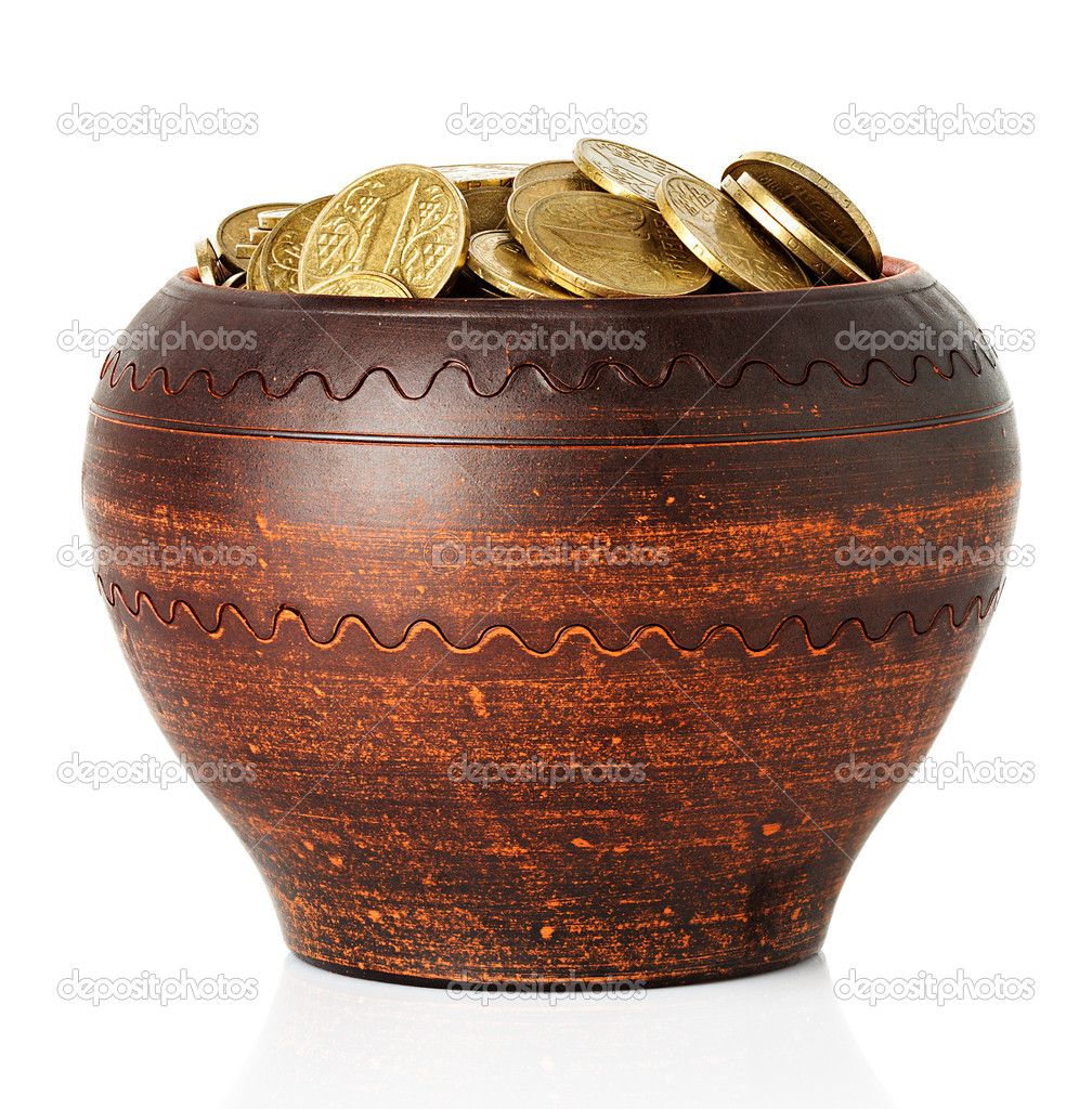 Golden coins in ceramic pot, isolated