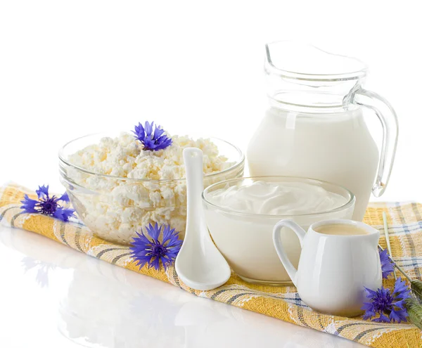 Zuivelproducten. melk, room, zure room en kwark Stockafbeelding