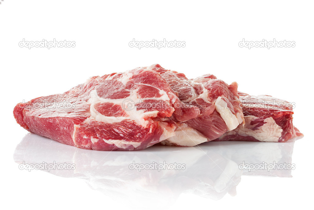 Pieces of crude meat. Steak