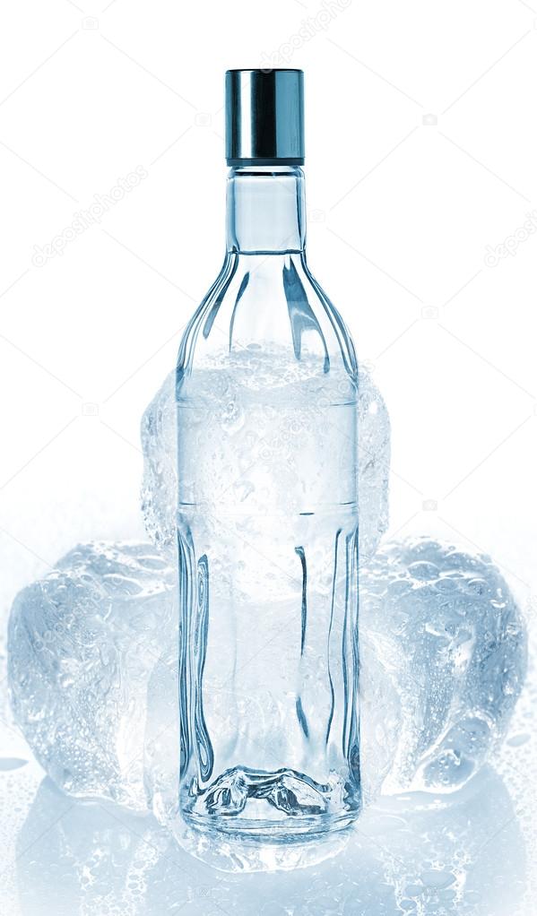 Bottle of vodka and ice cubes