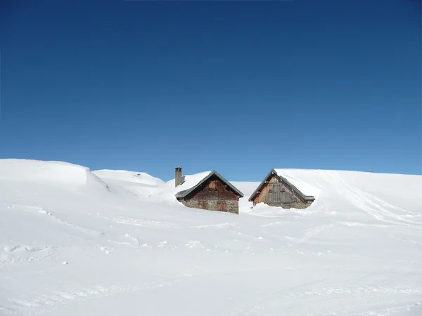 Huts in deep snow on the Alps — Stock Photo, Image