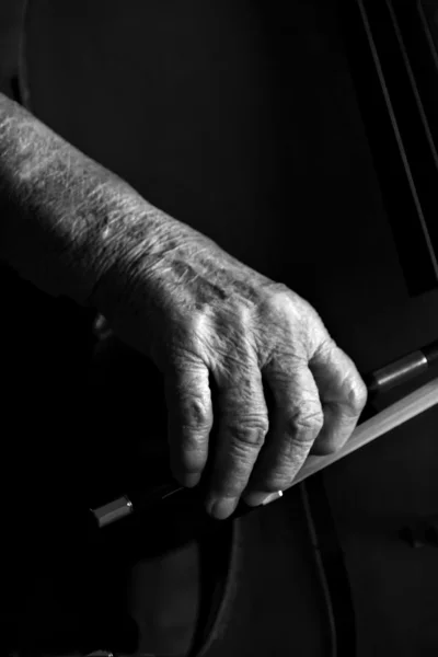 A senior hand playing cello — Stock Photo, Image