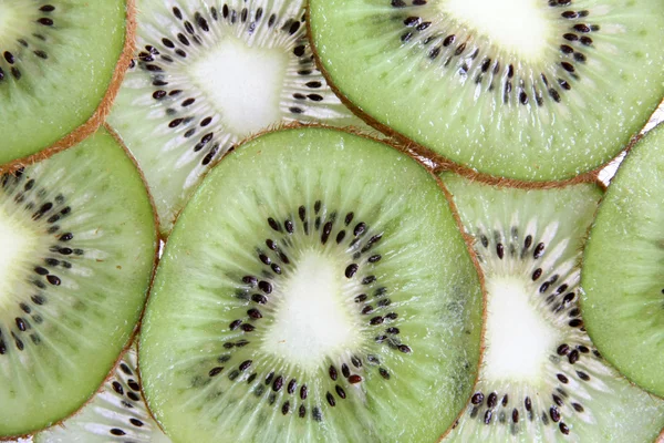 Kiwi slices for background and texture — Stock Photo, Image