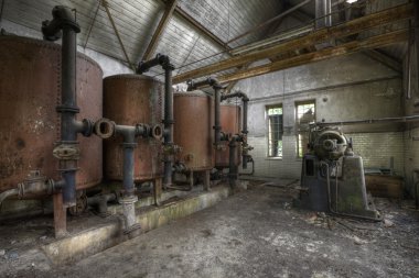 Interiors of an abandoned factory clipart