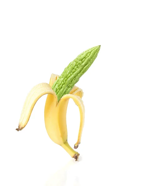 GMO food technology - bitter gourd growing in banana — Stock Photo, Image