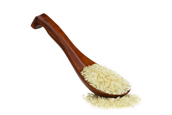 Ryż jaśminowy w drewniane łyżki — Zdjęcie stockowe