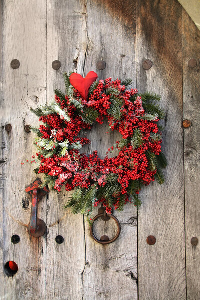 Christmas wreath on an old wood door