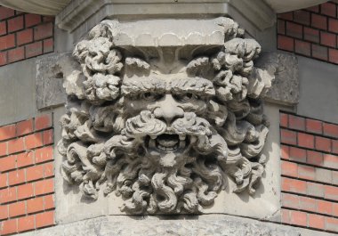 Corbel of an oriel window - display of an imaginary face clipart