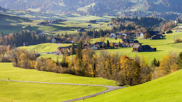 Panoroma of village in Swiss Appenzellerland in autumn season atmosphere of morning softlight - 