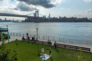 BROOKLYN -AUGUST 28 - A view of the three bridges along the East River as seen from Domino Park on August 28 2022 in Brooklyn NY.