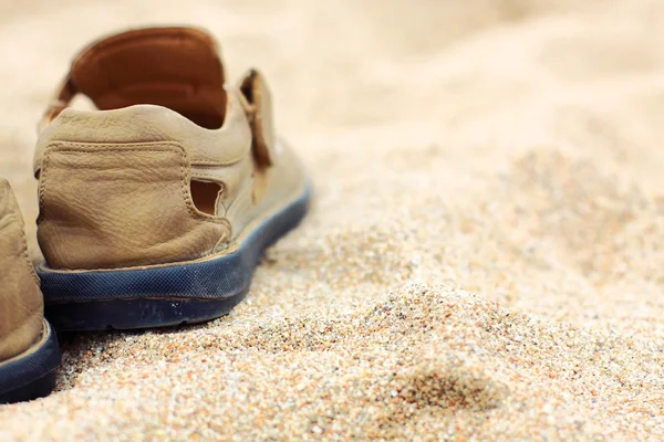 Boots on the sand Stock Picture