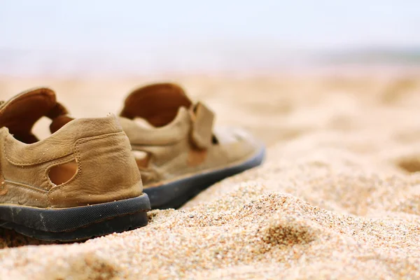 Boots on the sand Royalty Free Stock Images