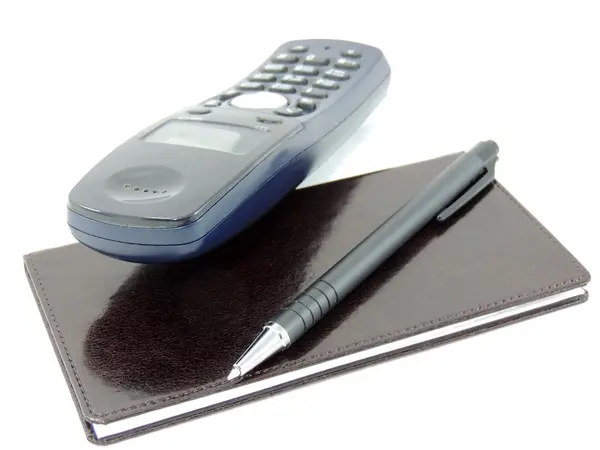 Telefon pad och penna — Stockfoto