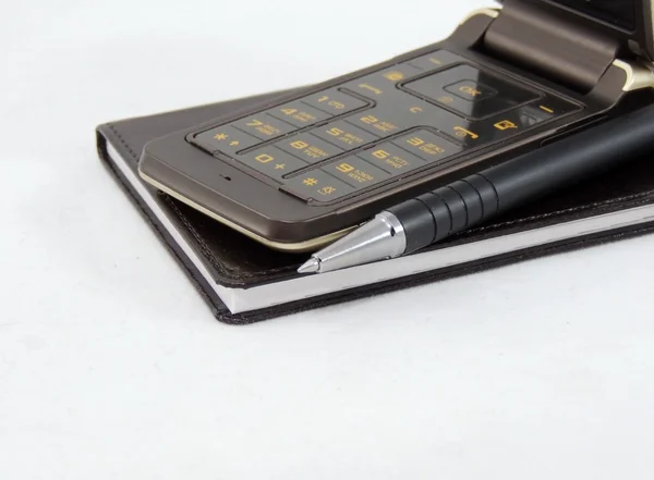 Telefon defteri ve kalem — Stok fotoğraf