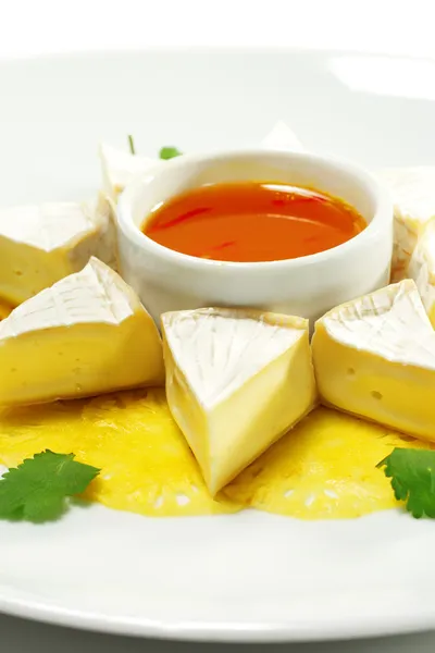 Fromage Queso con salsa de miel de naranja —  Fotos de Stock