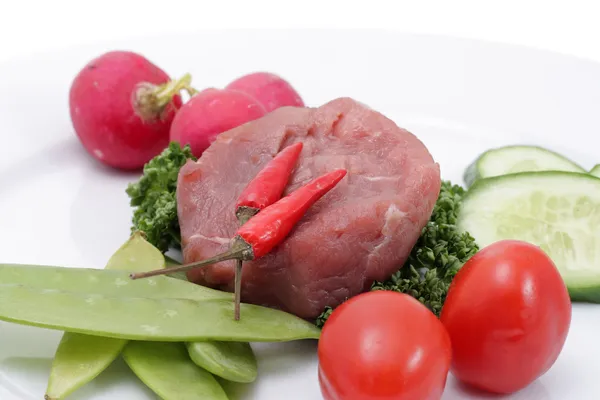 Vegetables and raw meat — Stock Photo, Image