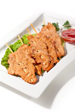 Şişlenmiş domuz eti.