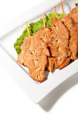 Şişlenmiş domuz eti.