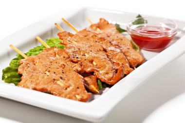 Şişlenmiş domuz eti.