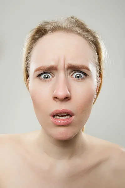 Funny portrait of young woman looking scared, dorky silly funny — Stock Photo, Image