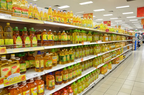 Aceite de cocina con cáscara en el mercado —  Fotos de Stock