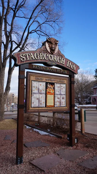 Sign board of Stagecoach inn — Stock Photo, Image