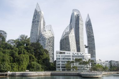 Singapore Dec 29 2021: Keppel Bay Marina and Reflections at Keppel Bay luxury waterfront residential complex in Singapore clipart