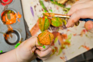 Making colored palm. Bouquet of dried bends and flowers. An Easter palm is a traditional Polish and Lithuanian symbolic decoration associated with Palm Sunday.