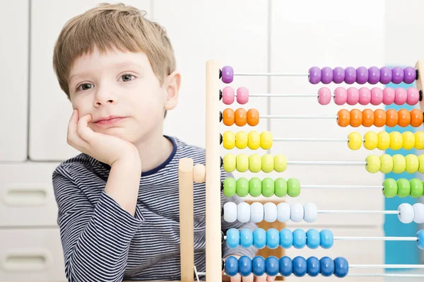 Cute Kid Playing Abacus Home Smart Child Learns Count Wooden — стоковое фото